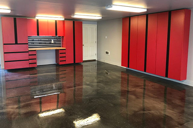 red custom garage cabinets and epoxy garage floor covering