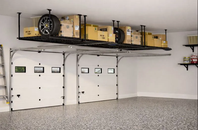 overhead storage racks in an organized garage